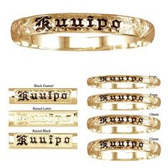 an engraved gold ring with the names of four different people