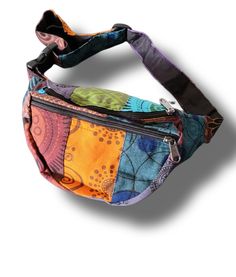 Introducing the Multicolor Patchwork Fanny Pack from the Nepsera Collection! Handcrafted in Nepal using traditional techniques, this fanny pack is a one-of-a-kind accessory that will add a pop of color and personality to any outfit. Featuring a patchwork design of vibrant hues, this fanny pack is made from durable and high-quality materials, ensuring it will withstand daily use. The adjustable waist strap allows for a comfortable and secure fit, making it perfect for all-day wear. Inside the mai Waist Strap, Patchwork Designs, Buy 1 Get 1, New City, Traditional Techniques, Buy 1, Fanny Pack, Running Errands, Nepal