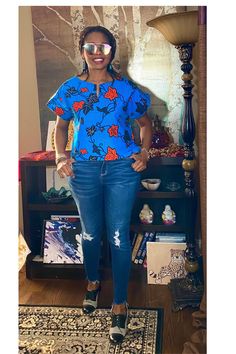 Our new unique Ankara top is made from African fabric 100% cotton. Wear this fun short Ankara top over pants, skirts, shorts, or jeans. Our items will be specially handmade to order in our studio upon ordering.  We are happy to answer questions regarding measurements. Maximum Length: Approximately 22" To shop our longer-length tops click below: https://www.etsy.com/shop/VeesFabDesigns?ref=seller-platform-mcnav&section_id=27870128 Please view the inserted pics for your selections. To purchase, place the item in your cart, and include at least your bust and hip measurements.   For reference, the model is 5'7" and wears a Medium, for a fuller fit you may go up a size. 🛑 Please note some slight color variations due to differences in computer monitors. Measurements Guide: See inserted pictures Blue Non-stretch Short Sleeve Top, Multicolor Non-stretch Cotton Tops, Non-stretch Multicolor Cotton Tops, Stretch Cotton Floral Print Tops, Stretch Cotton Tops With Floral Print, Chic Multicolor Cotton Tops, Cotton Stretch Floral Print Blouse, Stretch Cotton Blouse For Vacation, Stretch Cotton Blouse With Floral Print