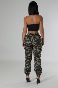 Make a bold fashion statement with these camo cargo high waisted jogger pants. ideal for the trend-savvy woman. The high-waisted design highlights your waistline, while the camouflage pattern adds a tough, street chic element to your ensemble. With functional cargo pockets and a relaxed fit, these joggers are perfect for creating a fierce, on-trend outfit. Pair them with heels to dress it up or with a graphic tee and ankle boots to complete your edgy, fashion-forward look. Stretch pants High-wai High Waist Camouflage Military Bottoms, High Waist Combat Bottoms For Streetwear, High Waisted Camouflage Parachute Pants For Streetwear, High Waist Camouflage Parachute Pants For Streetwear, High Waist Combat Pants For Streetwear, Camouflage Cargo Jeans For Streetwear In Fall, Military High Waist Parachute Pants With Cargo Style, Fall Season Camouflage Cargo Jeans For Streetwear, High Waist Khaki Cargo Pants For Streetwear