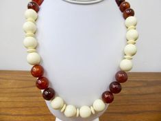 - Retro Cream and Torte Plastic Beaded Necklace - Round and flat plastic beads - 30 inch necklace - Clean and in good condition K 2561 Bethlehem Pa, Carved Shell, Bethlehem, Pink Rhinestones, Plastic Beads, Beaded Necklaces, Precious Jewelry, Loom Beading, Jewelry Making Beads