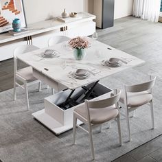 a white table with four chairs around it