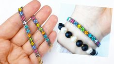 a hand holding two bracelets with beads on each side and one bead in the middle