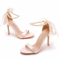 Details: Style: elegant Embellishment: Bow, Faux Pearl Heels Type: Stiletto Heel height: 10.5cm Closure Type: one-strap buckle Toe: Open Toe Upper Material: Satin Sole Material: Rubber Lining Material: PU Leather Feminine Ankle Strap Heels For Prom, Glamorous Ankle-high Heels For Formal Occasions, Glamorous Ankle-high Heels For Formal Events, Chic Pearl Embellished Ankle Strap Wedding Shoes, Elegant Ankle Tie Wedding Sandals, Elegant Ankle-tie Wedding Sandals, Elegant Spring Ankle Wrap Heels, Elegant Ankle-high Heels For Party, Elegant Ankle Tie Heels For Wedding