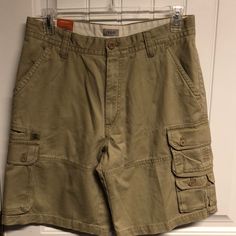 Nwt Izod Tan Cargo/Utility Shorts. Size 34. Inseam Approx 10”. Short Utility Cargo Pants For Outdoor, Khaki Cotton Bottoms For Outdoor Activities, Casual Cargo Shorts For Outdoor With Belt Loops, Military Style Shorts For Outdoor With Pockets, Relaxed Fit Cargo Shorts With Pockets For Outdoor, Military Khaki Shorts With Pockets, Outdoor Khaki Cargo Shorts With Belt Loops, Military Style Short Bottoms With Pockets, Khaki Hiking Bottoms With Multiple Pockets