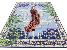 a blue rug with a tiger on it