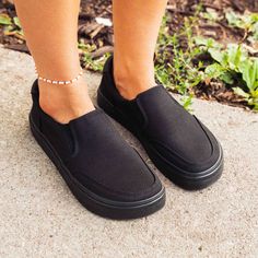 Black Flat Heel Slip-ons For Everyday, Comfortable Black Slip-ons For Everyday, Comfortable Black Slip-ons With Flat Bottom, Black Slip-ons For Spring, Black Slip-ons For Everyday Spring Wear, Casual Solid Color Slip-ons, Medium Width Low-top Slip-ons With Rubber Sole, Black Slip-ons With Textured Sole For Everyday, Embrace Your Dark Side