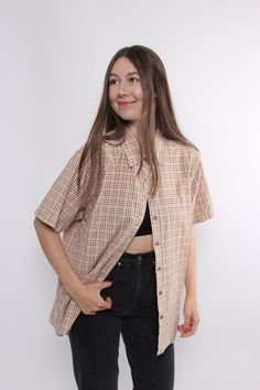 Hi! Welcome to TARASCOMMON.ETSY.COM, your destination for unique clothing from the 20th century! This listing includes a 90s plaid print short sleeve button up blouse in multicolor design. This top is perfect for adding a touch of retro charm to your wardrobe. Key Features: 90s funky retro button up top Vintage style plaid blouse Size: LARGE. Measurements (taken seam to seam while lying flat): Sleeve: 12cm / 4.72inch (armpit to end of sleeve) Width: 63cm / 24.8inch Length: 68cm / 26.77inch Mater Trendy Short Sleeve Plaid Blouse, Summer Plaid Collared Tops, Spring Plaid Short Sleeve Shirt, Trendy Plaid Short Sleeve Blouse, Plaid Collared Top For Summer, Summer Plaid Relaxed Fit Blouse, Summer Plaid Blouse With Relaxed Fit, Plaid Short Sleeve Summer Blouse, Summer Plaid Short Sleeve Blouse