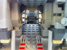 the inside of a lego star wars set with lights on and red tape around it