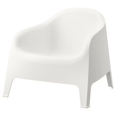 a white plastic chair sitting on top of a white floor