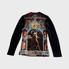 100% Authentic JPG Jean Paul Gaultier graphic print round neck long sleeve top. 𐙚 Features an iconic time machine psychedelic punk gothic grungy archival print.  Lovely stretchy material fits so nicely. Labelled a 38 which equates to a medium/UK 10, will aslo fit a small/UK 8  Length 58cm, pit-pit 42cm, sleeves 71cm Overall very good vintage condition, some slight bobbling on the arms due to age but doesn't affect the overall look of the top MODEL: Wears a size Small/UK 8 Some signs of wear for second-hand clothing are to be expected. Larger faults will be mentioned in the description. Fitted Punk Tops With Graphic Design, Fitted Vintage Top With Graphic Design, Punk Graphic Print Tops For Fall, Graphic Print Tops For Alternative Winter Fashion, Fitted Long Sleeve Tops With Unique Print, Fitted Long Sleeve Top With Unique Print, Long Sleeve Graphic Print Tops For Alternative Fashion, Retro Long Sleeve Tops With Graphic Design, Fitted Sublimation Print Grunge Tops