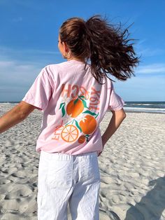 Our *EXCLUSIVE* Sunhoney Florida Orange Tshirt in Pink is your new tee to bring on your next beach vacay! Add a pop of sunshine to your wardrobe with our Sunhoney Florida Orange Tshirt in playful pink. Made with high quality fabric, printed on Comfort Colors, this shirt will not only keep you stylish but also super comfy! Product is made to order: available for pick up/ships in 2-4 business days Content: 100% Cotton Fit: TTS - size up for oversized style Model wearing size: Medium Model sizing: Pink Short Sleeve T-shirt For Day Out, Pink Summer T-shirt For Day Out, Orange Relaxed Fit T-shirt For Beach, Orange Crew Neck Summer T-shirt, Relaxed Fit T-shirt With Screen Print For Day Out, Fun Summer T-shirt With Front Print, Pink Letter Print T-shirt For Day Out, Cute Crew Neck T-shirt For Beach Season, Orange Short Sleeve Top For Beach Season