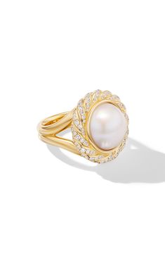 A large South Sea pearl glows from the center of the diamond-embellished cable halo setting on this exquisite ring in a vintage-inspired design. Total diamond weight: 0.58ct. Pearl size: 15.7mm Sterling silver or 18k gold/South Sea pearl/diamond Imported >Diamond Guide Luxury Oval Pearl Ring With Center Stone, Luxury Yellow Gold Pearl Ring With Center Stone, Luxury Pearl Ring With Rose Cut Diamonds For Anniversary, Elegant Yellow Gold Halo Ring With Rose Cut Diamonds, Elegant Formal Halo Ring With Pave Setting, Luxury Round Pearl Ring With Halo, Luxury Yellow Gold Pearl Ring With Rose Cut Diamonds, Luxury Formal Pearl Ring With Halo, Elegant Yellow Gold Halo Ring