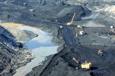 an aerial view of a large open pit