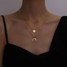 Elevate your celestial style with our Moon Three Layer 18K Layer Necklace. Featuring three delicate layers, each adorned with a shining 18K gold plated moon and star. Complete with an easy clasp closure for effortless wear. Perfect for adding a touch of celestial charm to any outfit.