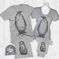 These Penguin Family Matching T-Shirt designs are available in 8 unique clothing styles and colors in all sizes, including men and women tees, tank tops, sweatshirts, and hoodies. Each shirt graphic is professionally hand screen printed on super soft ring-spin tees with a vintage look and soft hand feel. [ SIZING MEASUREMENTS ] SEE SIZE CHART Men's & Kids Tee sizes run true to size. Whatever size you normally wear should fit fine. This includes Tanks. Women's tee sizes might run a bit small Unisex Funny Print Top For Gift, Unisex Tops With Funny Print Gift, Cute Unisex Tops For Family, Cute Family Tops, Family Cartoon Print Cotton Tops, Family Matching Cartoon Print Cotton Tops, Family Cotton Tops With Cartoon Print, Family Matching Cotton Tops With Cartoon Print, Unisex Graphic Print Tops For Family