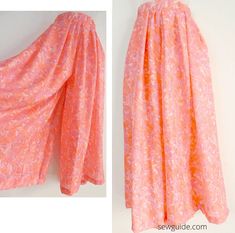 an orange and pink skirt with white flowers on it