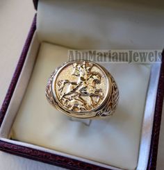 St George's and the dragon heavy man ring round 10K gold historical religious Greek Orthodox Christian all sizes jewelry Risk free Quality guarantee policy : If you are not satisfied with your item for any reason simply send it to us and you will get a replacement or refund . gold : 10 k gold Approx. ring weight : 18.00 grams stamped 10K nice gift box included . certificate invoice from our shop of weight and gold purity . 10K Gold is used . Face width 18 mm , band width 7 mm FULL INSURANCE UPS Collectible Gold Rings With Historical Design, Antique Gold Engraved Ring With Historical Design, Ceremonial Signet Ring With Intricate Design, Historical Round Jewelry For Anniversary, Anniversary Jewelry With Historical Design, Gold Round Signet Ring Collectible, 14k Gold Byzantine Ring Gift, Engraved Byzantine Yellow Gold Jewelry, Luxury Spiritual Men's Yellow Gold Ring