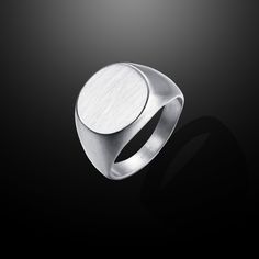 The ultimate power accessory. Our classic men’s Signet Ring is designed with tapered edges and a leveled top, then finished with a fine brush to create a distinctive, satin-textured luster. 316L Stainless Steel Head, 10mm Wide Smooth Brushed Finish Modern Silver Rings With Brushed Finish, Classic Rings With Brushed Finish For Formal Occasions, Signet Ring Silver, Silver Signet Ring, Meaningful Jewelry, Silver Cuff Bracelet, Classic Man, Ring Silver, Jewelry Pouch