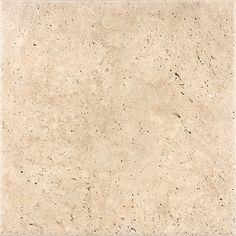 an image of a white marble tile textured with brown speckles and black dots