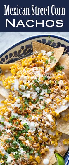 mexican street corn nachos on a blue and white plate