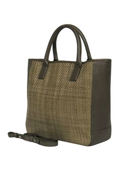 Elevate your accessory game with this woven leather tote from Shinola, featuring a unique use of leather and a practical hook swivel closure. Carry it by the handles or use the removable and adjustable straps for a hands-free experience - pair it with a flow maxi dress and espadrilles for a stylish day on the go. Handcrafted leather Made in the USA Woven leather front Hook swivel clasp top closure Two interior slide-in pockets on the sides One interior card slot Silver-toned hardware Width 13.5” Luxury Satchel With Braided Handles For Travel, Woven Leather Satchel For On-the-go, Luxury Woven Bags For On-the-go, Modern Woven Leather Crossbody Bag, Modern Woven Leather Shoulder Satchel, Versatile Leather Satchel With Braided Handles, Modern Woven Leather Bucket Bag With Double Handle, Modern Woven Leather Bucket Bag Tote, Modern Woven Leather Tote Bucket Bag