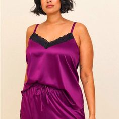 New With Tags Sold Out At Torrid Torrid Sleep Cami - Lace Trim Tank - Dream Satin Soft - Violet - Plus Size *Dream Satin Woven Fabric: A Soft, Stretchy Satin That's Smooth And Cool Against Your Skin. - V Neck. - Sleeveless. - Camisole Profile. - Measures 30" From Shoulder (Size 2). - Lace Trim Detail. - 92% Polyester, 8% Spandex. - Machine Wash Cold. Tumble Dry Low. New To Poshmark? ** Use Offer Code "Curvyfashion4u" For $10 Off Your First Purchase. (Details From Torrid) 19621865/Qe Purple Sleeveless Sleep Camisole, Purple Sleeveless Camisole For Sleep, Purple Sleeveless Camisole For Loungewear, Purple Camisole Top For Loungewear, Purple Cami Tops For Loungewear, Purple V-neck Camisole For Loungewear, Torrid Lingerie, Red Lace Babydoll, Pajama Dress