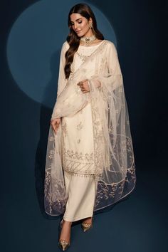 Pearl White Pakistani Salwar Kameez Dupatta Suit is enhanced with delicate contrasting hand embellishments, cut dana, hanging tassels & embroidered borders. White Embroidered Shirt, Hanging Tassels, Pakistani Salwar, Raw Silk Fabric, Dress Salwar Kameez, Pakistani Salwar Kameez, Organza Dupatta, Organza Fabric, Silk Dupatta