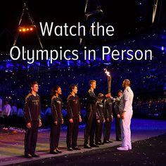 the olympic team is holding their torch at the end of the ceremony