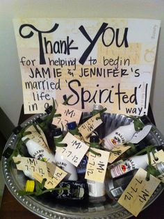 a bowl filled with lots of different types of items next to a sign that says thank you