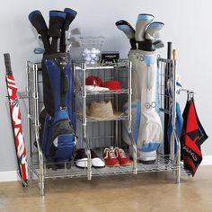 a rack with shoes, umbrellas and golf gear