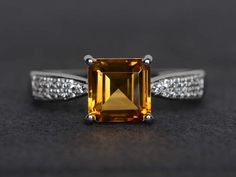 Welcome to my shop, you can find many beautiful gemstone jewelry here, and you also can ask for customized service. Main Stone: natural citrine, square cut, measures 7X7mm, weight 1.60 carats;Accent Stones: noneMetal: 925 sterling silver plated with rhodium. I also can provide metal options such as 14k solid yellow/white/rose goldSetting: prong settingMy shop home: https://www.etsy.com/shop/XCjewelryStudio?ref=hdr_shop_menuIt's a perfect gift for the person who was born in November (Birthstone), Luxury Citrine Crystal Ring As Gift, Luxury Citrine Crystal Ring Gift, Luxury Silver Citrine Crystal Ring, Mystic Topaz Engagement Ring, Minimalistic Jewellery, Ring Yellow Stone, Opal Birthstone Ring, Yellow Stone Ring, Cushion Cut Wedding Rings