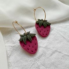 All earrings are crafted carefully by hand and are completely unique! Because of this, please allow for any slight variations and/or imperfections. All posts are nickel-free. For the newest designs, follow @madonesstudio on instagram! Pink Pierced Hoop Earrings For Gift, Handmade Berry Colored Earrings For Gift, Handmade Berry Earrings For Gift, Handmade Pink Everyday Jewelry, Unique Hoop Earrings As Gift, Handmade Pink Jewelry For Everyday Wear, Red Pierced Hoop Earrings, Adjustable Red Hoop Earrings, Handmade Polymer Clay Hoop Earrings