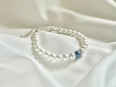 This would be a perfect gift for a bride! Something blue for bride bracelet or anklet with extender something blue bride gift wedding gift something blue initial wedding bracelet ------ This is not a cheap plastic pearl bracelet, it's a quality glass pearl bracelet. I make each peace of jewelry by myself and I would be happy to make any changes you want. Just write me a message! ------ These are average lengths of bracelets: newborn to 6 month -- 4" - 4,5" 6 month to 24 month -- 4.5" - 5" 2 to 4 Dainty Blue Bracelets For Wedding, White Pearl Bracelet With Extender For Wedding, White Pearl Wedding Bracelet With Extender, Adjustable Blue Pearl Bracelet For Wedding, Bride Something Blue, Wedding Something Blue, Something Blue For Bride, Bride Bracelet, Cowgirl Wedding