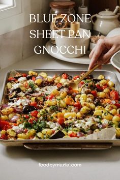 a pan filled with food sitting on top of a counter