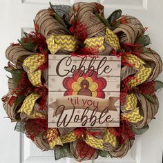 a wreath that says coffee till you wobble