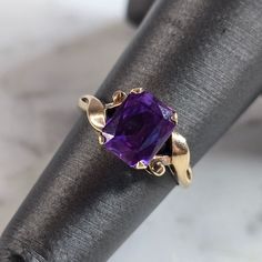 A Womens Vintage Estate 10k Yellow Gold Amethyst Colored Stone Ring. The Ring Weighs 1.9g, And Is A Size 4.75. The Length Of The Ring Is 5/16". Ring Is Marked On The Inside Of The Band. Any Questions, Please Don't Hesitate To Ask. This Would Make A Lovely Gift. Be Sure To Check Out Some Of My Other Great Items Up For Sale. Thank You. Classic 14k Gold Amethyst Birthstone Ring, Purple Birthstone Ring In 14k Gold, Classic Purple Gemstone Birthstone Ring, Classic Purple Birthstone Ring With Gemstone, 14k Gold Purple Emerald Cut Rings, Purple Birthstone Ring In 14k Gold For Promise, Purple 14k Gold Rings With Emerald Cut, Purple 14k Gold Ring With Emerald Cut, Fine Jewelry Amethyst Ring Stamped 14k