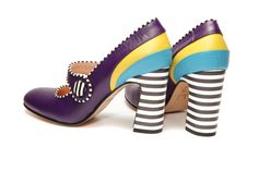 Unique purple Mary Jane high heel leather pump truly presents phrase: Shoe love is true love! Made in purple color of softest leather they are celebration of shoes in most colorful and playful way. Set on stiped high block heel makes them extremely comfortable and stabile. Underneath the button is hidden elastic so they fit every width. Embellished with black and white stripes on piping and big button they are special as every woman wearing them. Extravagant but extremely comfortable these high Purple Heels With Reinforced Heel And Pointed Toe, Purple Pointed Toe Heels With Reinforced Heel, Purple Heels With Sculpted Heel And Round Toe, Multicolor Round Toe Heels With Sculpted Heel, Multicolor 4-inch Leather Heels, Purple Round Toe Heels With Reinforced Heel, Multicolor Heels With Contrasting Heel And Round Toe, Purple Heels With Reinforced Heel And Round Toe, Multicolor Heels With Contrasting Heel Counter