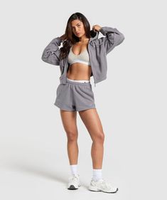 IN YOUR COSY ERA Meet your new wardrobe staples. Movie nights in, spilling the tea to your bestie, or a throw-on piece post-workout, we’ve got you covered with your new faves. Upgrade your rest day style to a ten. • Full zip • Open pockets on each side to hold the essentials • Drop shoulder design • Panelled seams to enhance the style and structure • Elasticated hems • Embroidered badge logo to the back SIZE & FIT• Oversized fit• Regular length• Model is 5'8" and wears XS MATERIALS & CAR Cozy Workout Hoodie, Comfortable Fleece Activewear For Gym, Cozy Activewear With Drawstring Hood For Workout, Cozy Workout Activewear With Drawstring Hood, Comfy Activewear With Drawstring Hood For Workout, Spring Fleece Activewear For Gym, Rest Day, Embroidered Badges, Gym Fits