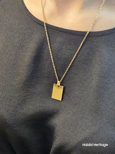 The Rectangular Gold Blank Necklace is a beautiful and versatile piece of jewelry. Made with 18k gold plated stainless steel, it can be worn as is or customized with engravings of meaningful dates, names, and phrases. Perfect for any occasion, this necklace is a timeless accessory that can be treasured for years to come. Timeless Accessories, Ring Bracelet, Men Necklace, Ring Necklace, You Bag, Bracelets For Men, Jewelry Shop, Car Accessories, Womens Necklaces