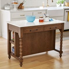 a kitchen island with two bowls on it