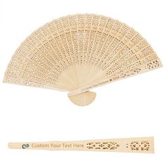 a wooden fan with laser cutouts on the side and an ad for custom text