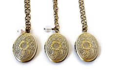 "Flower Gold Locket Necklace - Bohemian Floral Oval Locket - Vintage Photo Locket - Personalize Gift for Her . . . Beautiful bohemian etched style carved rose floral and vine antique gold brass oval flower locket necklace. There is plenty of room inside this beautiful Victorian inspired locket necklace for your favorite photos, or your secret message. This lightweight locket pendant suspends from hypoallergenic high quality soldered oval link antique gold brass electroplated chain and fastens wi Antique Oval Necklaces With Charms, Bohemian Gold Keepsake Jewelry, Antique Gold Oval Pendant Necklace With Locket, Antique Gold Necklace With Oval Locket Pendant, Elegant Flower Charm Locket Pendant Necklace, Elegant Flower Charm Locket Necklace, Bohemian Locket Necklace With Vintage Charm For Gift, Elegant Locket Necklace With Flower Charm Round Pendant, Elegant Keepsake Locket Necklace With Flower Charm