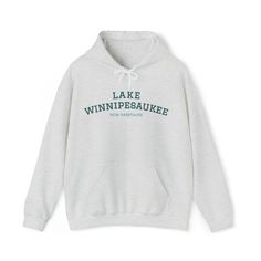 Lake Winnipesaukee Sweatshirt Teal, New Hampshire Hoodie, Trendy Preppy Shirt, Oversized Lake Sweatshirt, Aesthetic Clothes, Womens Hoodie *This unisex heavy blend hooded sweatshirt is relaxation itself. Made with a thick blend of cotton and polyester, it feels plush, soft and warm, a perfect choice for any cold day. In the front, the spacious kangaroo pocket adds daily practicality while the hood's drawstring is the same color as the base sweater for extra style points. .: 50% cotton, 50% polyester .: Medium-heavy fabric (8.0 oz/yd² (271 g/m .: Classic fit .: Tear-away label .: Runs true to size SIZING: *This is a unisex hoodie that fits true to size and is not overly large. *For an OVERSIZED FIT, size up 2 - 3 Sizes! (2 sizes up is the most common) *For a slightly RELAXED FIT, size up 1 Athletic Heather Hoodie With Graphic Print, Athletic Heather Long Sleeve Hoodie With Graphic Print, Crew Neck Hoodie In Athletic Heather For College, Athletic Heather Crew Neck Hoodie For College, Athletic Heather Fleece Hoodie With Letter Print, Athletic Heather Hoodie Sweatshirt With Adjustable Hood, Casual Athletic Heather Hoodie For College, Casual College Hoodie In Athletic Heather, Fall Hoodie In Athletic Heather With Letter Print