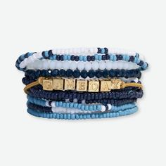 Bracelet Stack Game Day Light Blue + White + Navy Blue Stackable Friendship Bracelets For Everyday, Blue Stacked Bracelets With Round Beads, Blue Stacked Beaded Bracelets, Adjustable Stacked Blue Bracelets, Blue Stacked Round Bead Jewelry, Stack Game, Stacked Beaded Bracelets, Blue Game, Bead Bracelets