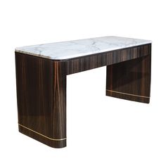 a marble top desk with gold trimmings on the legs and bottom, against a white background