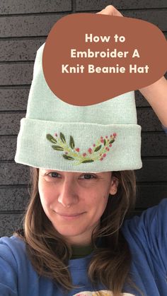 a woman wearing a knit beanie hat with the words how to embroider a knit beanie hat