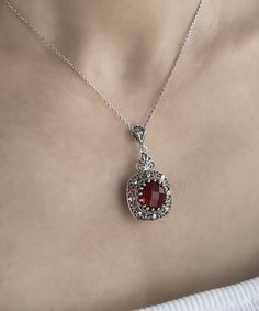 "Ruby Gemstone Silver Gothic Pendant Necklace, 925 Sterling Artisan Made Filigree, Red Ruby Quartz Gemstone Goth Woman Handmade Jewelry Gothic Pendant Necklace, July Pendant Necklace, birthstone necklace, goth women necklace, bridal shower gift, gothic wedding gift Gemstone: Ruby Quartz 12 mm. Ruby is the July birthstone - and it's one of the most coveted of gems. The name is derived from the Latin word ruber, meaning \"red\" - the color of love and passion. Material: 925 Sterling Silver ( NICKE Ornate Red Pendant Jewelry, Red Oval Sterling Silver Necklace, Ruby Jewelry With Stone Setting As Gift, Silver Ruby Jewelry With Stones, Ruby Necklace With Round Stone Setting, Red Victorian Necklace For Anniversary, Red Intricate Design Jewelry For Gift, Antique Red Necklace For Wedding, Round Ruby Necklace With Stone Setting