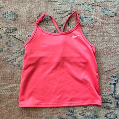 Pink Dri-Fit Racer Back Top With Adjustable Straps. Built In Bra. Never Worn. Size M Nike Sporty Tops For Playwear, Sporty Nike Top For Playwear, Sporty Pink Top For Playwear, Sporty Pink Tops For Playwear, Nike Pink Tops For Gym, Nike Tops For Gym In Spring, Nike Pink Gym Tops, Pink Stretchy Top For Playwear, Sporty Fitted Tops For Playwear