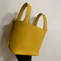 Size: (18x22cm) It comes with Dust box, Care manual, Tag and Paper bag. Modern Yellow Box Bag With Detachable Handle, Modern Yellow Box Bag With Removable Pouch, Tan Rectangular Bucket Bag With Detachable Handle, Yellow Box Bag With Removable Pouch For Shopping, Yellow Box Bag With Dust Bag For Everyday Use, Luxury Yellow Bucket Bag With Removable Pouch, Yellow Bucket Bag With Detachable Handle, Designer Yellow Box Bag For Everyday Use, Modern Yellow Tote Box Bag